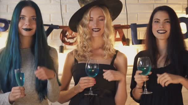 Three Beautiful Women Showing Thumbs Gesture Having Fun Halloween Eve — Stock Video