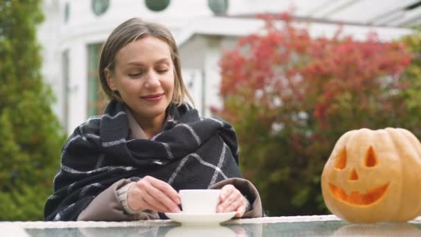 Happy Woman Drinking Tea Smiling Pumpkin Jack Halloween Celebration — Stock Video