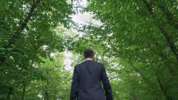 Businessman Walking Forest Throwing Away All Papers Enjoying Freedom — Stock Video