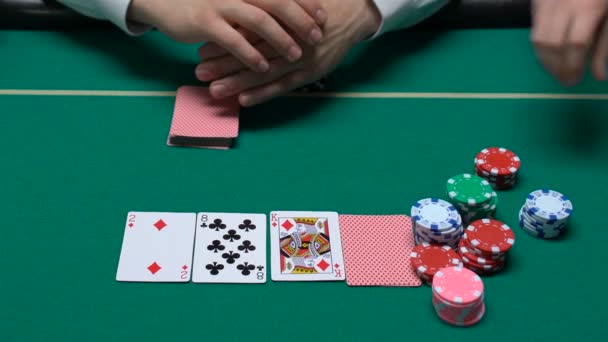 Male Croupier Dealt Cards Waiting Players Making Bets Poker Game — Stock Video