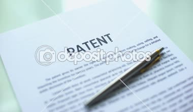 Patent belgesi mühür resmi kağıt üzerinde telif hakkı kanunu damgalama el onaylı,