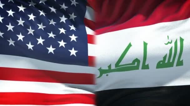 Vereinigte Staaten Und Irakische Flaggen Hintergrund Diplomatische Und Wirtschaftliche Beziehungen — Stockvideo