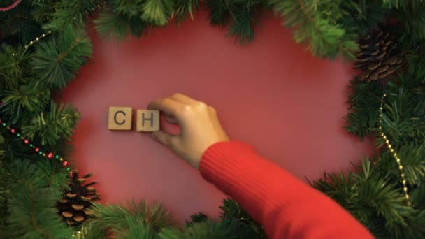 Weihnachten Weibliche Hand Macht Wort Der Würfel Feier Des Jährlichen — Stockvideo