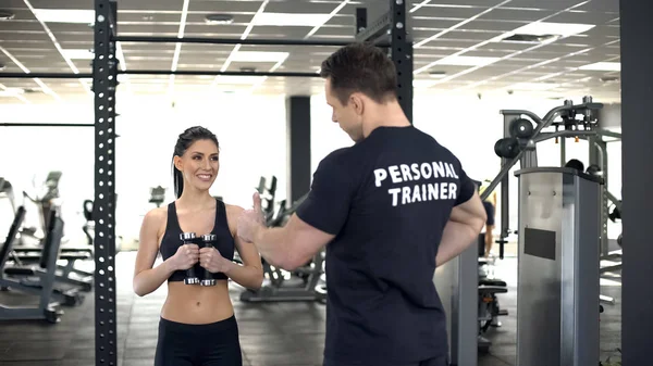 Personal Trainer Showing Thumbs Fit Girl While Exercising Motivation — Stock Photo, Image