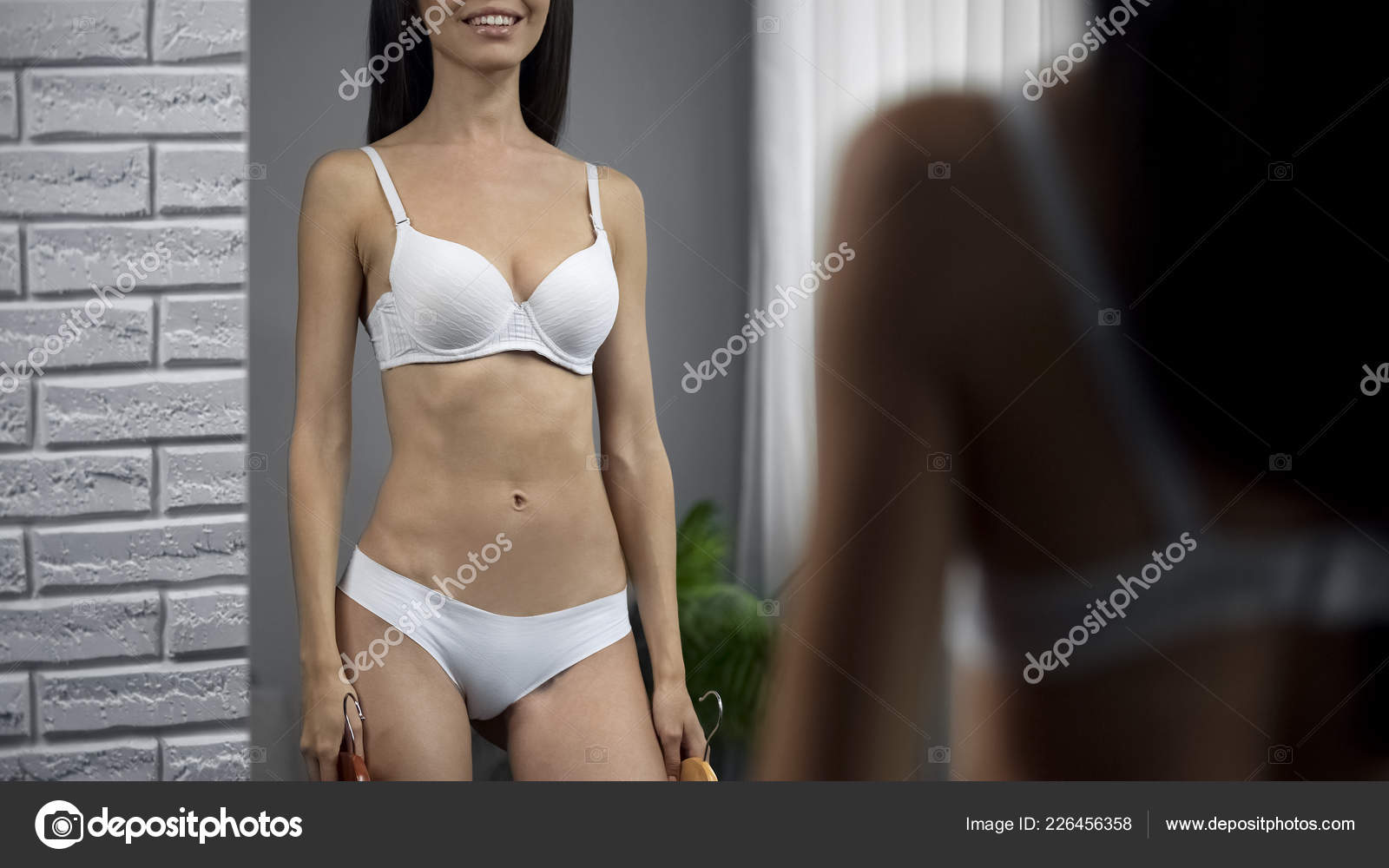Happy Female Bra Underwear Enjoying Mirror Reflection Clothing Store Stock  Photo by ©motortion 226456358