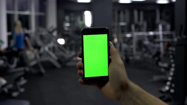 Sportsman Comprobando Aplicación Teléfonos Inteligentes Línea Monitoreando Pulso Pantalla Verde —  Fotos de Stock