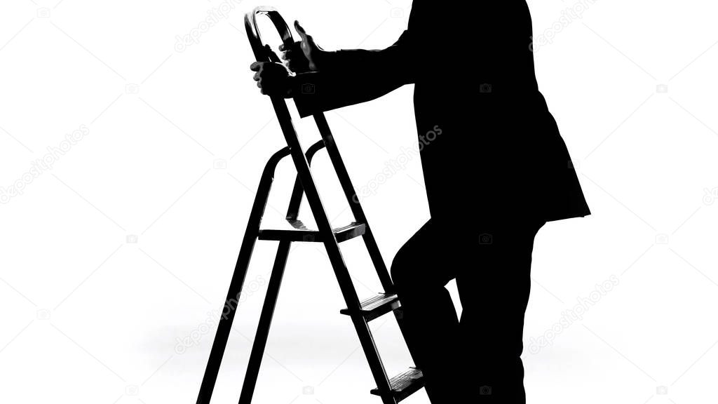 Man in business suit climbing up career ladder, got job promotion, progress