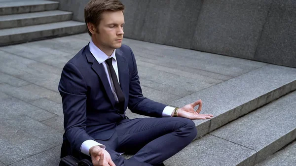 Young Businessman Lotus Position Calming Important Meeting Stress — Stock Photo, Image