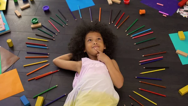 Adorable Little African American Girl Lying Floor Thinking Holidays — Stock Photo, Image