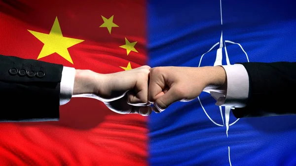 China Nato Conflict International Relations Crisis Fists Flag Background — Stock Photo, Image