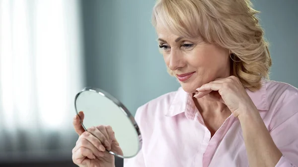 Lady Looking Herself Mirror Rejoicing Result Skin Lifting — Stock Photo, Image