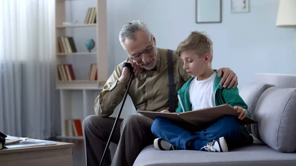 Granddad Reading Book Boy Doing Homework Together Upbringing Generation — Stock Photo, Image