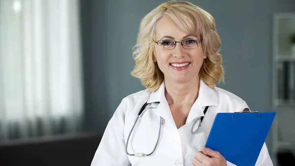 Friendly Smiling Lady Doctor Looking Camera Giving Hope Recovery Stock Image