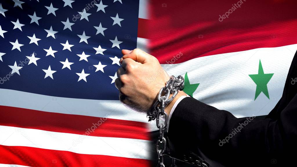 United States sanctions Syria, chained arms, political or economic conflict