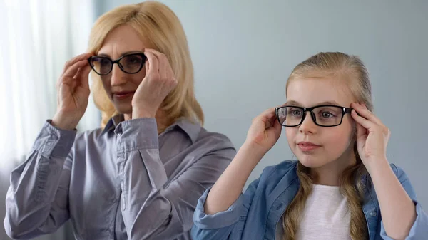 Little Blond Girl Putting Eyeglasses Wants Look Grandmother Family — Stock Photo, Image