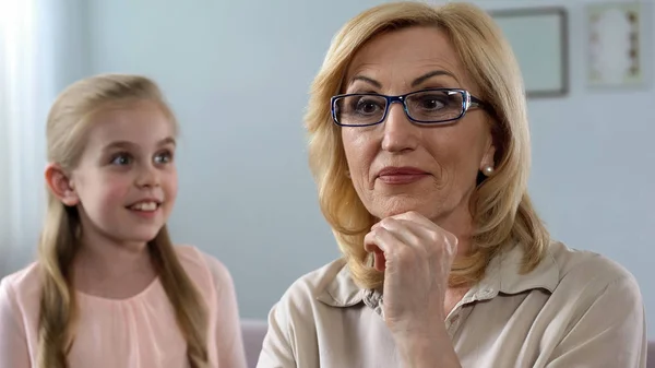 Cute Blond Granddaughter Whispering Secret Elderly Grandmother Lovely Family — Stock Photo, Image