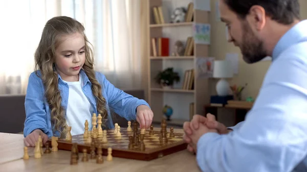 Little Daughter Thinking Next Move Playing Chess Father Strategy — Stock Photo, Image