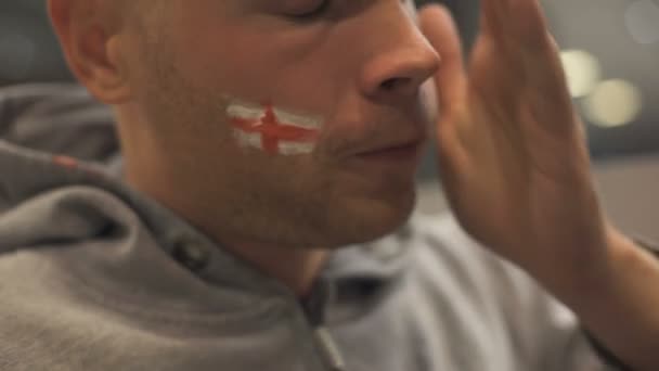 Extremely Sad Frustrated Football Fan Watching Match Emotions Face Closeup — Stock Video