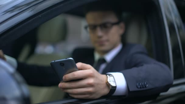 Serious Businessman Testing New Business App Telephone While Waiting Car — Stock Video