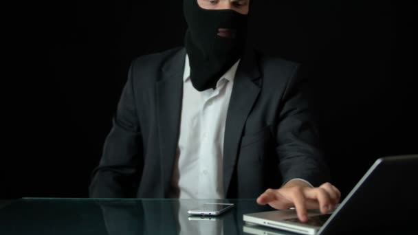 Gun Man Balaclava Using Computer Preparing Attack Blackmail Crime — Stock Video
