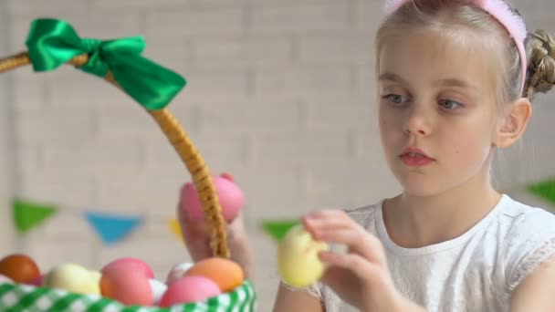 Adorable Little Hostess Packing Easter Basket Colorful Dyed Eggs Tradition — Stock Video