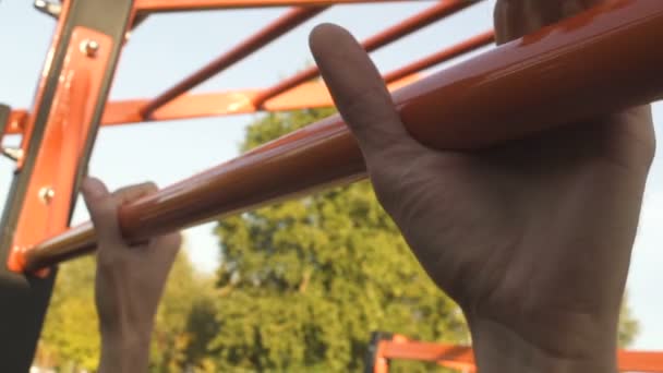 Man Finishing Doing Pull Ups Crossbar Give Sports Activity Hands — Stock Video