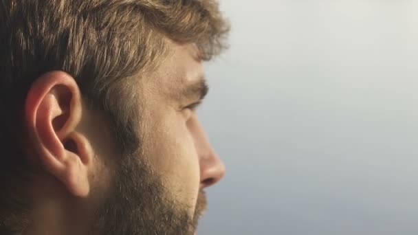 Man Looking Blue Sky Wrinkling Morning Sun Beams Awakening — Stock Video