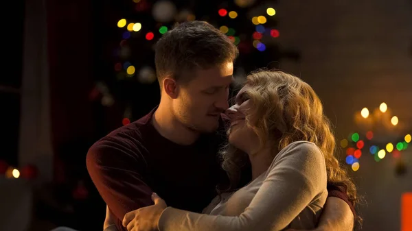 Loving Couple Embracing Tenderly Christmas Tree First Holiday Together — Stock Photo, Image