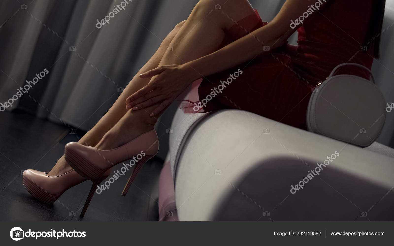 Beautiful Lady Red Dress Rubbing Sore Legs Tiresome Day Work Stock Photo by ©motortion 232719582