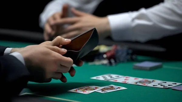Croupier Taking All Chips Money Upset Poker Player Showing Empty — Stock Photo, Image