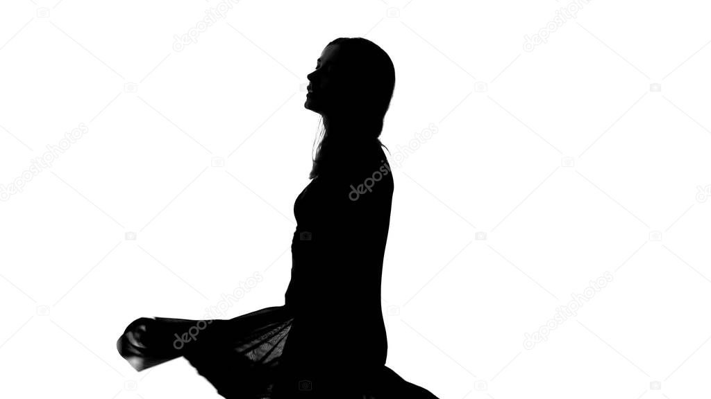Silhouette of attractive lady, dancing seductively, flirting, inner freedom