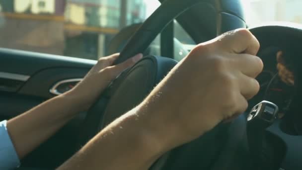 Womans Hands Holding Steering Wheel Attentively Driving Automobile Traffic — Stockvideo