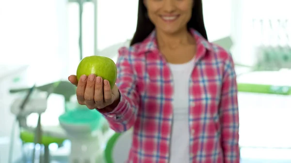 Beautiful Girl Showing Green Apple Camera Dental Office Healthy Teeth — Stock Photo, Image