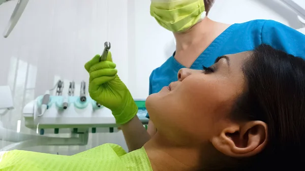 Female Dentist Preparing Drill Patients Lower Bicuspid Teeth Dental Services — Stock Photo, Image