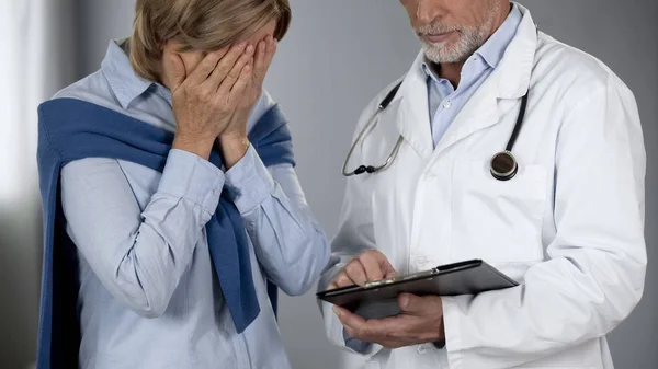 Elderly Woman Bitterly Disappointed Test Results Doctor Showing Records — Stock Photo, Image