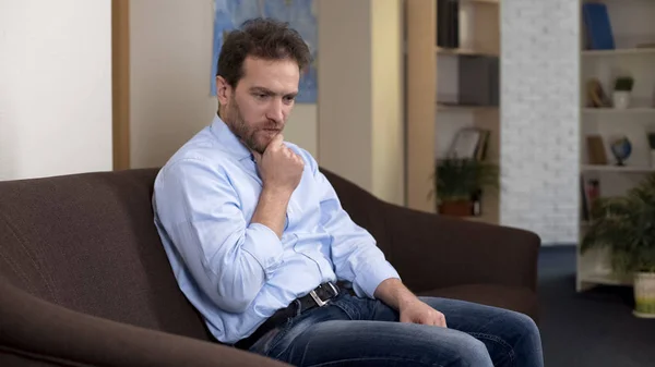 Thoughtful Mid Aged Male Couch Thinking Money Loss Negative Emotions — Stock Photo, Image