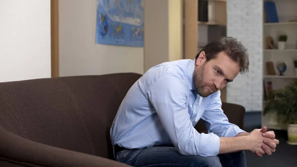 Pensive Male Sitting Couch Alone Home Losing Job Unemployment Problem — Stock Photo, Image