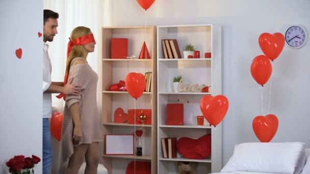 Man Leading Blindfolded Red Ribbon Lady Beautifully Decorated Room — Stock Video