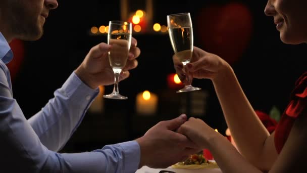 Handsome Man Tenderly Holding Female Hand Saying Toast Candlelight Dinner — Stock Video