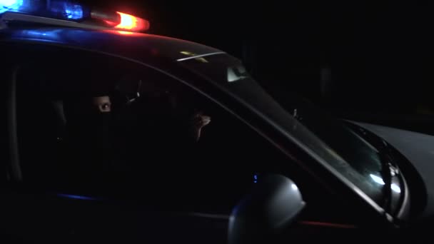 Killers Mask Sitting Patrol Car Threatening Victim Guns Criminality — Stock Video