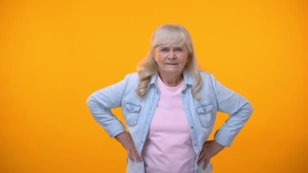 Elderly Woman Putting Hands Hips Looking Directly Camera Poor Vision — Stock Video