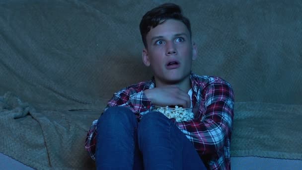 Scared Young Man Watching Horror Movie Home Alone Frightened Person — Stock Video