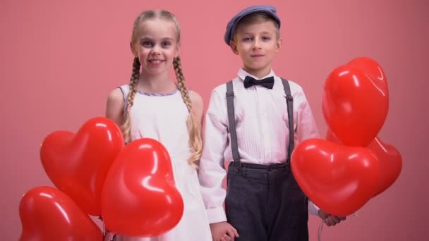 Couple Cute Kids Red Heart Balloons Smiling Camera Valentines Day Stock Footage