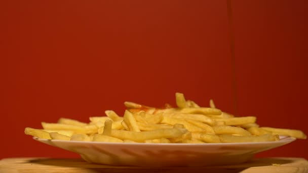ケチャップ過食 フライド ポテト 不健康なジャンク フードの完全版の削除 — ストック動画