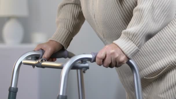 Weak Elderly Woman Using Walking Frame Spinal Surgery Rehab Center — Stock Video