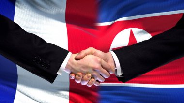 Fransa ve Kuzey Kore el sıkışma, Uluslararası dostluk, arka plan bayrak