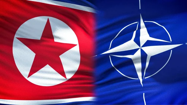Hintergrund Nordkoreanische Und Nato Flaggen Diplomatische Und Wirtschaftliche Beziehungen — Stockfoto