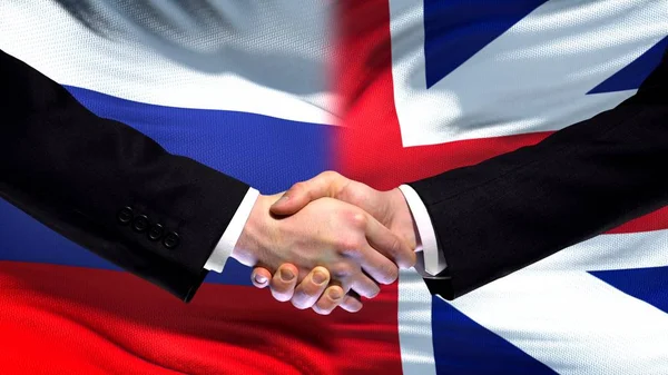 Rusland Groot Brittannië Handdruk Internationale Vriendschap Vlag Achtergrond — Stockfoto