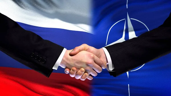 Rusland Navo Handdruk Internationale Vriendschap Relaties Vlag Achtergrond — Stockfoto