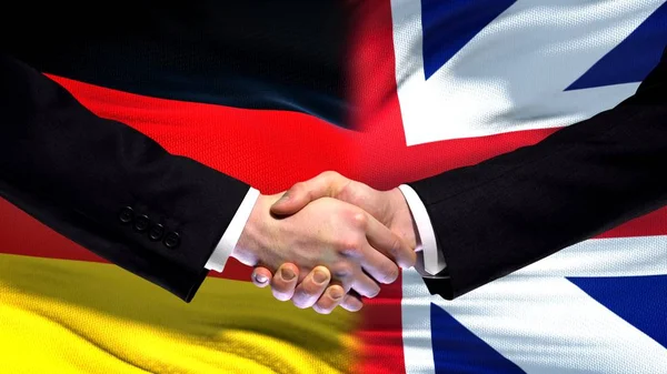 Tyskland Och Storbritannien Handslag Internationella Vänskap Flagga Bakgrund — Stockfoto